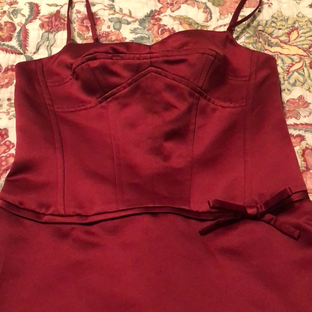 Never worn beautiful burgundy jewel toned dress. Beautiful a line shape!